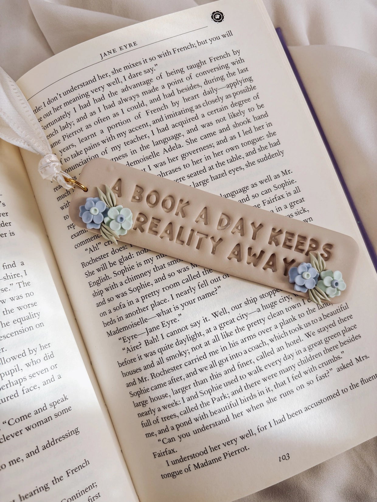 Clay Bookmark - "A Book A Day Keep Reality Away"