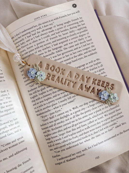 Clay Bookmark - "A Book A Day Keep Reality Away"